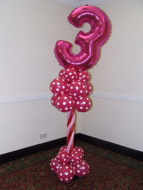 Balloon arrangement with number 3 foil balloon