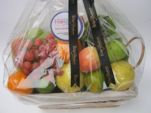 Assorted mix fruits in wicker basket