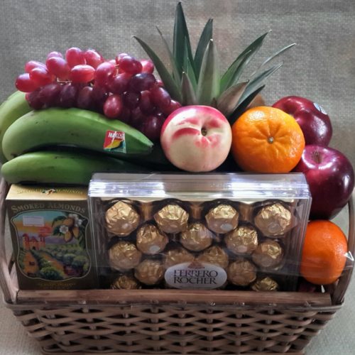 A basket filled with assorted fruits and nuts