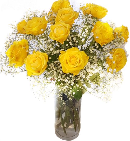 Yellow Roses with gypsophilia flower arrangement in a clear vase