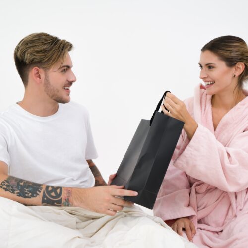 Woman holding gift bag