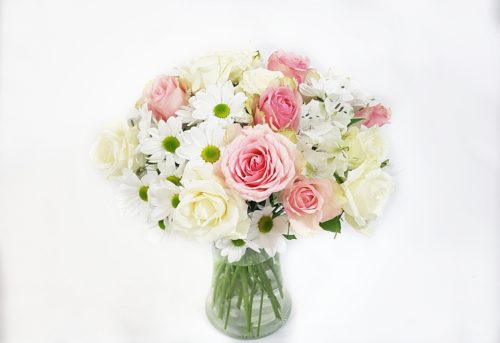 Pink.white rose,chrysanthemum and Alstromeria in a clear vase