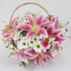 Basket of flowers with Lilies, roses and chrysanthemum