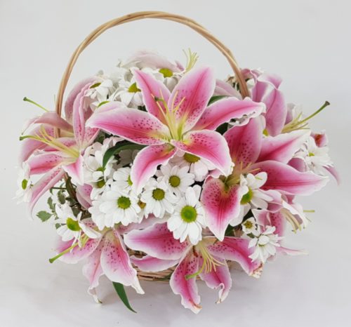 Basket of flowers with Lilies, roses and chrysanthemum