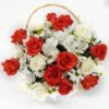 Red and white roses arranged in a basket