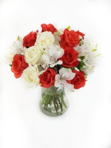 red and white rose mix in a vase flowers