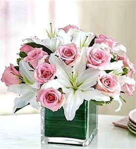 Pink Roses and Lilies in square flower vase