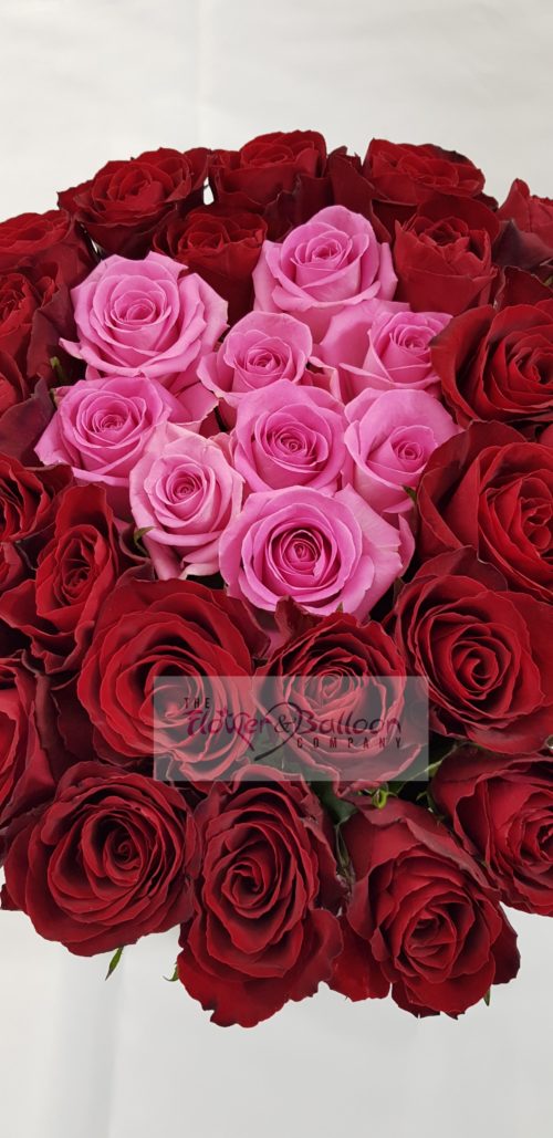 close up image of Valentine Roses Box- red and pink roses