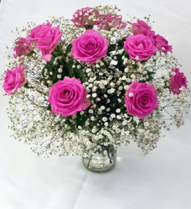 pink roses vase with gypso in a vase
