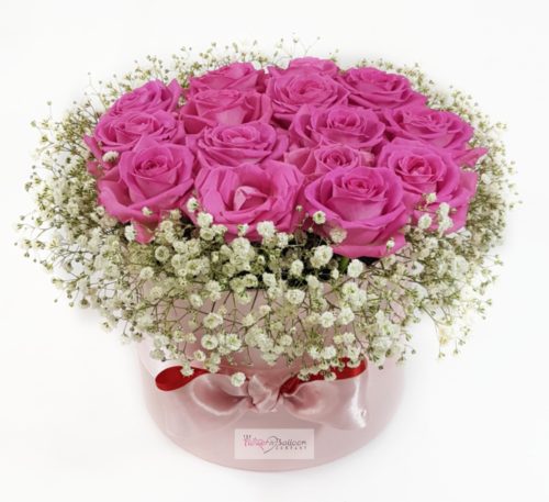 Pink box with pink roses and gypsophila