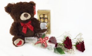 The perfect bundle gift package with Brown Teddy with Box of Chocolate and roses 