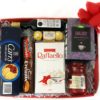 Hamper Box with a selection of chocolates snacks and wine