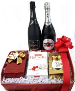 Luxury gift hamper- The Jolly Holly Box is a hamper gift box with chocolates and two wine bottles