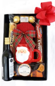 Black Box with Snacks, Wine and Christmas Gift Mug