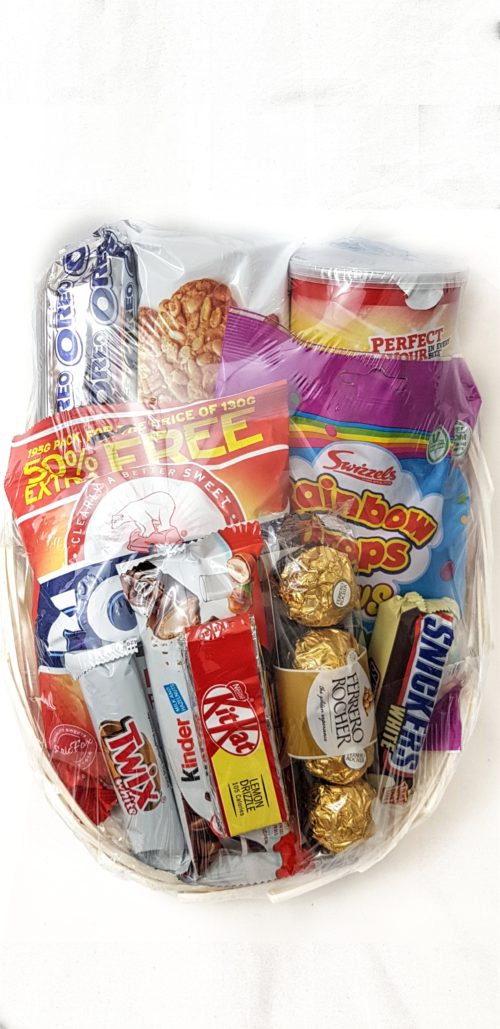 A basket of assorted sweets and chocolates