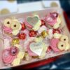 Vanilla strawberry cream cupcakes with toppings